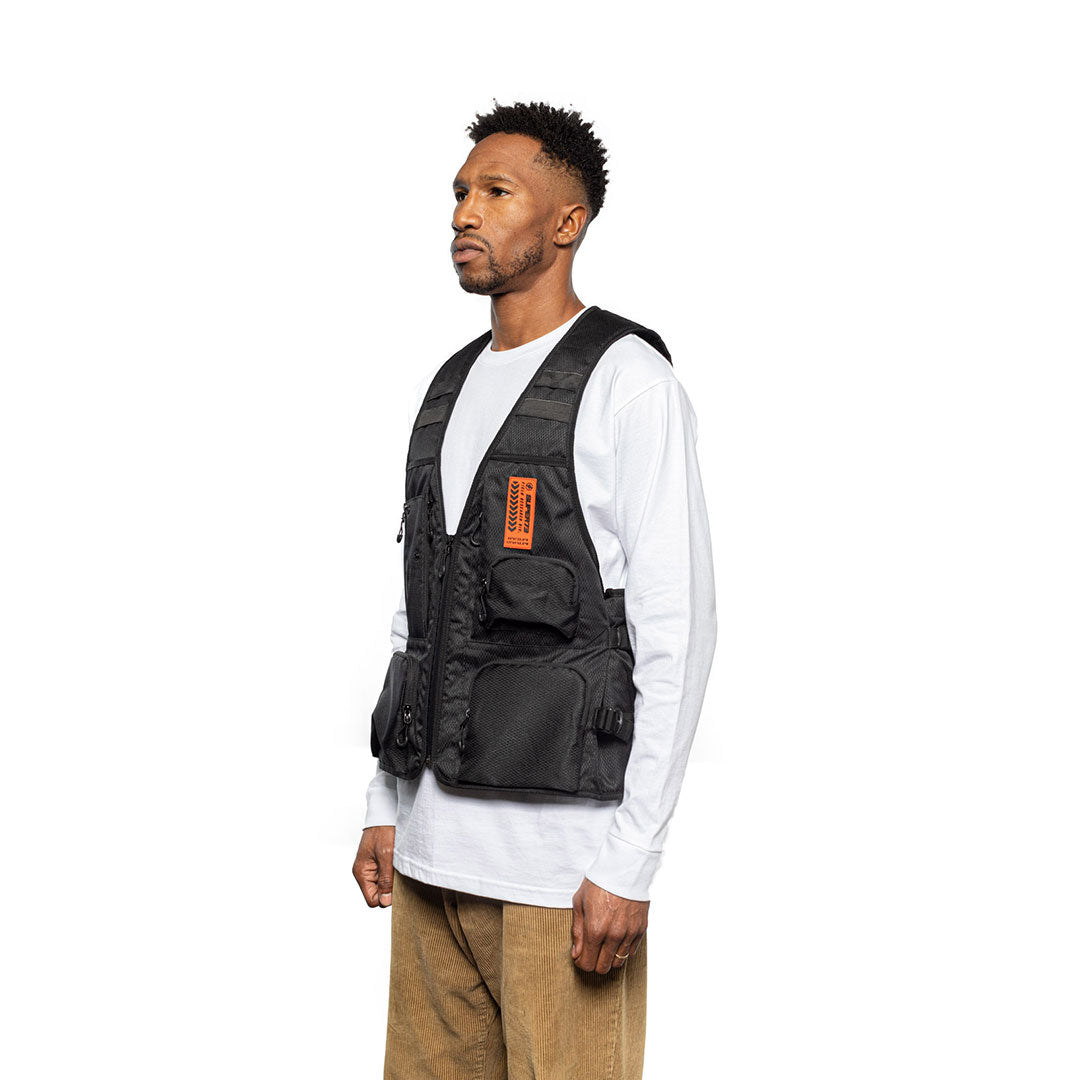 Model wearing a Super73 and Field Research Division Collection Mule Vest