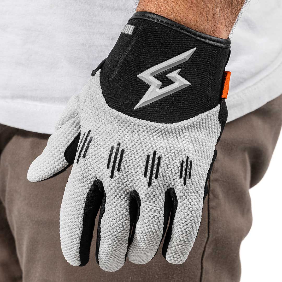 Model wearing Super73 and Field Research Division Trax Glove