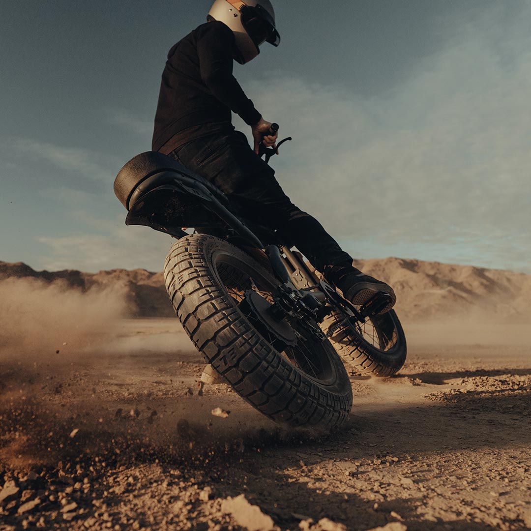 Man riding a Super73-S2 in the desert 