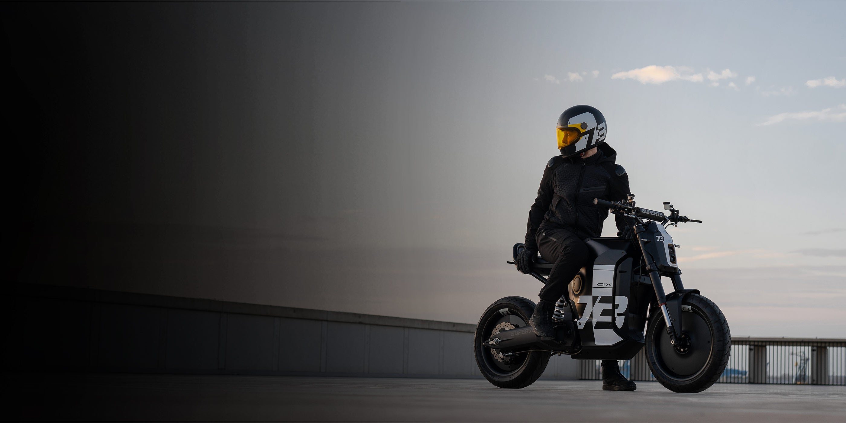 Man is riding the C1X electric motorbike